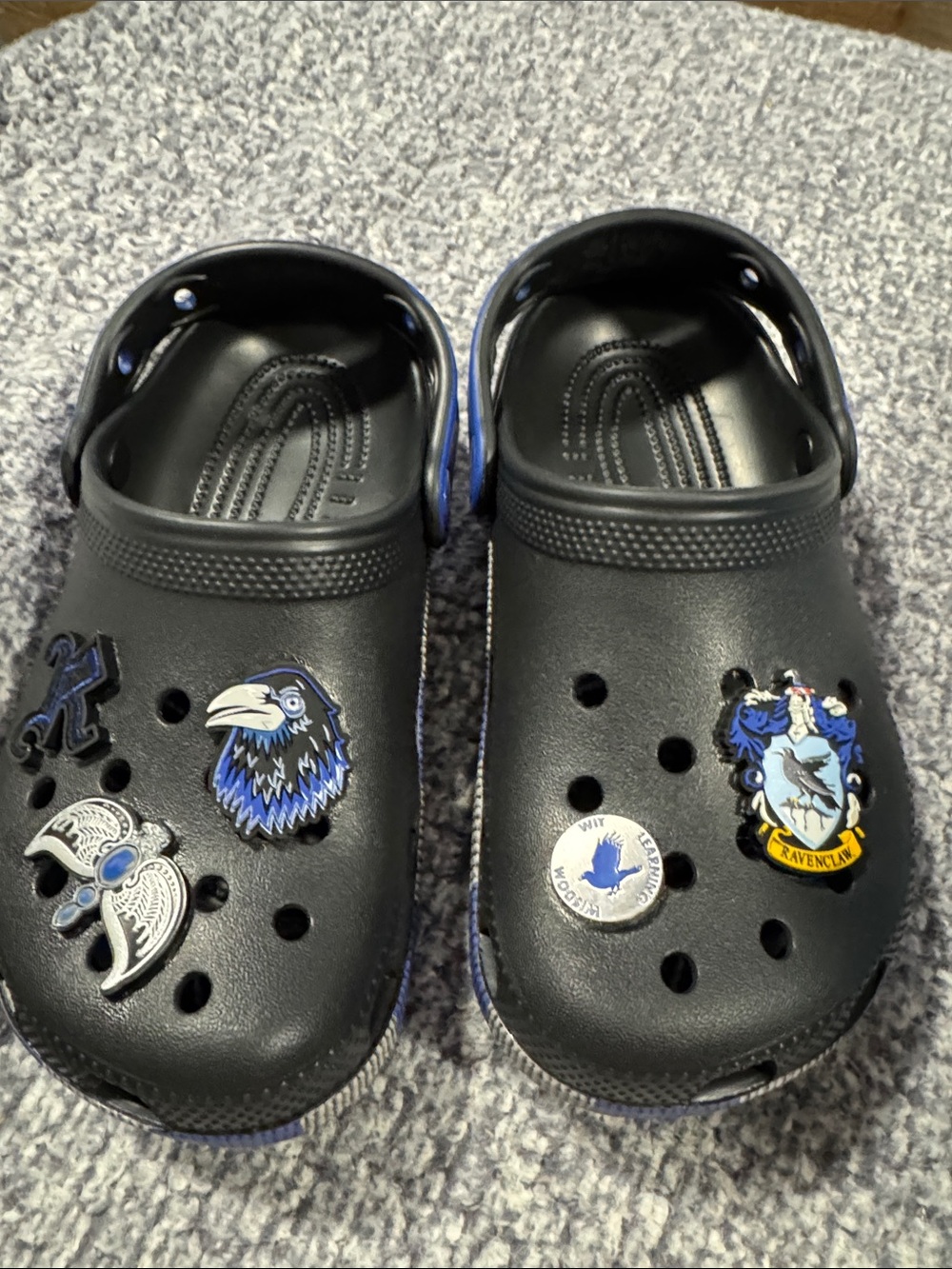 CROCS Black Kids Clogs with Blue Raven & Crest Charms